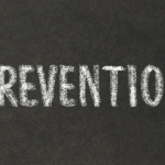 Chalk-style text 'PREVENTION' on dark background, emphasizing B&L Plumbing's winter emergency service awareness.